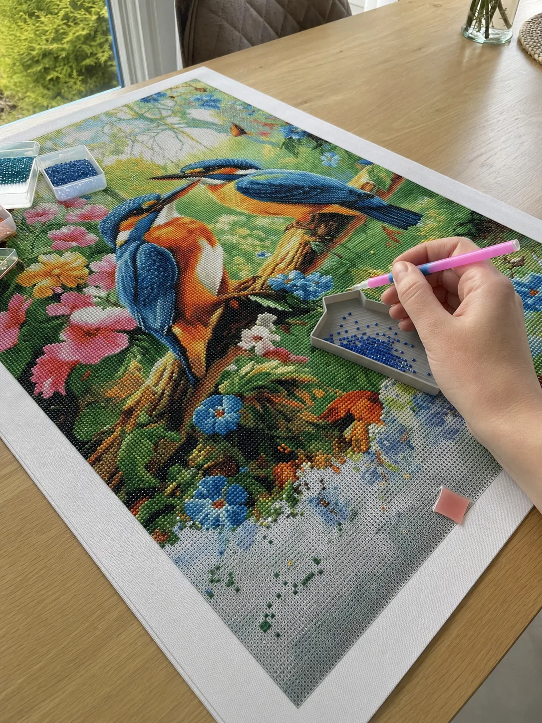 Voorbeeldweergave van het ijsvogelontwerp tijdens het plaatsen van steentjes