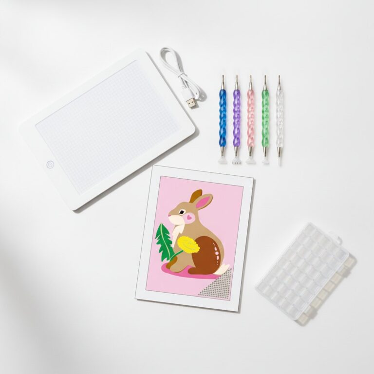 Starterspakket diamond painting met doek Konijntje 20x25 cm, LED-lightpad A4, vijf pennen en sorteerdoos op een witte ondergrond