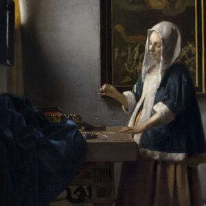 Vrouw met weegschaal van Johannes Vermeer: een vrouw in een blauwe jak met bontrand houdt een kleine weegschaal vast, met parels op tafel